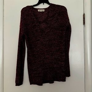 Sweater with cross cross detail